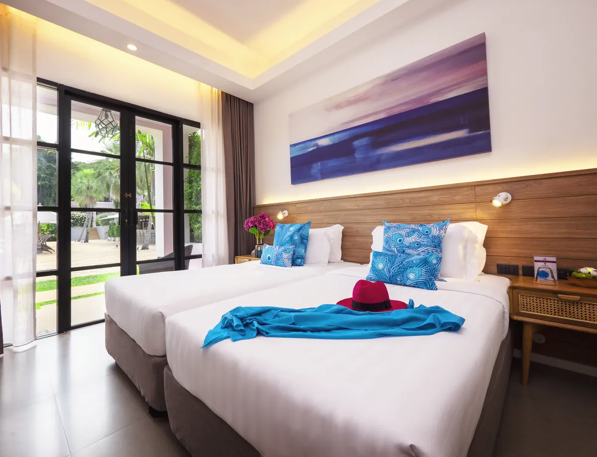 A Sanctuary Superior twin room with garden doors